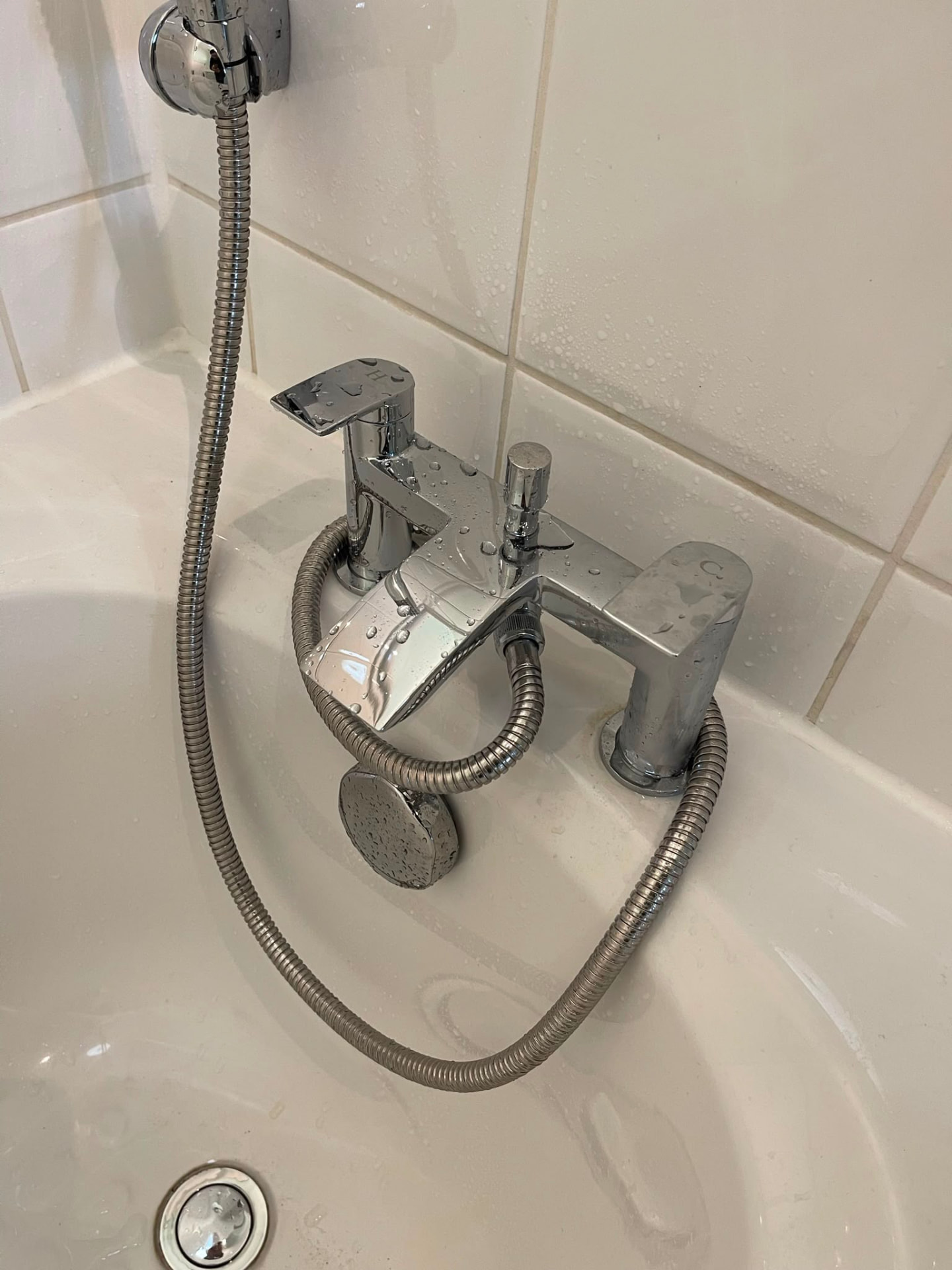 New chrome bath shower mixer tap fitted during a bathroom installation, fitted by Gas Safe registered engineers in Essex